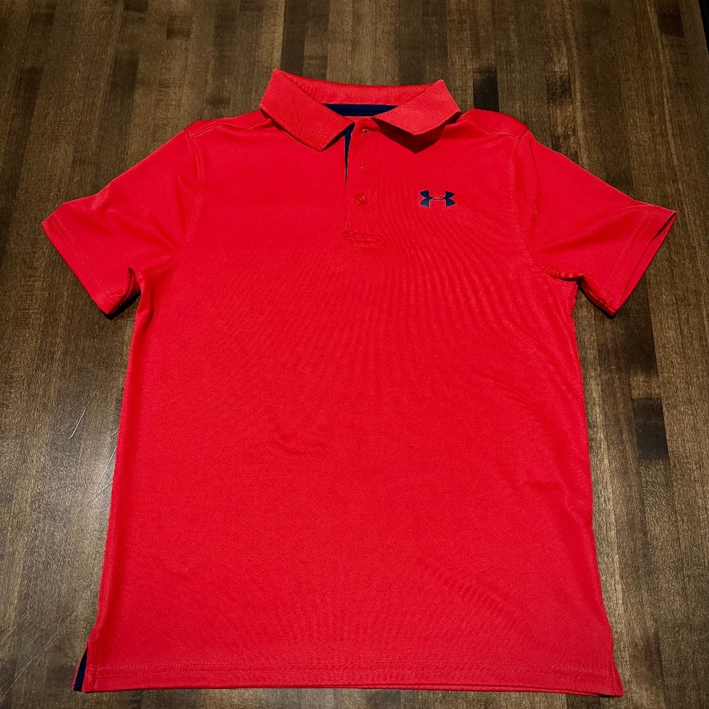 New without tags.  Kids Under Armour Polo shirt.  Sz YM